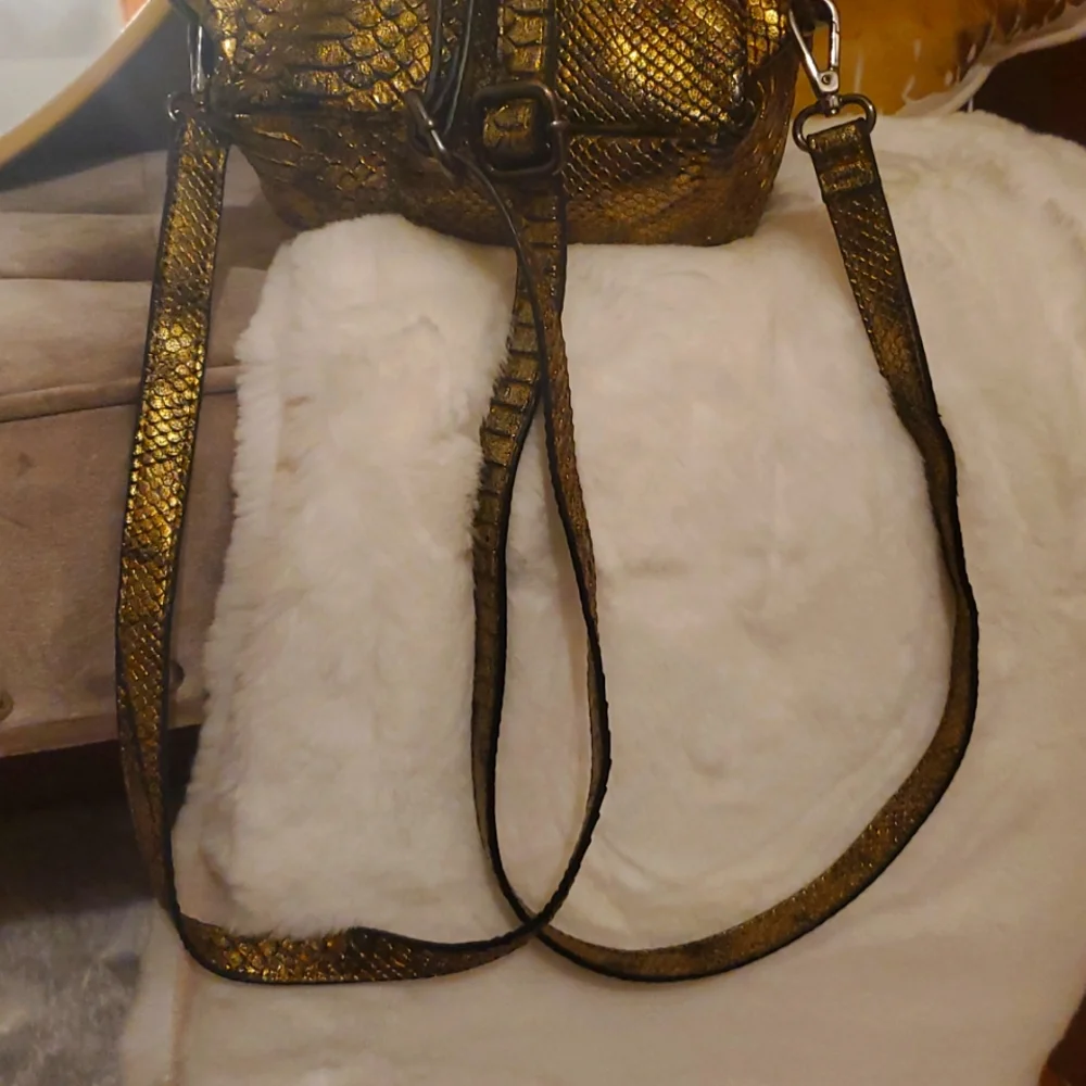 BCBG Paris Gold Snake Print Mini Backpack